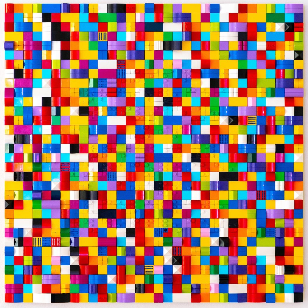 Jaye Moon Our Differences, 2022 2100 Lego bricks on wood 20 x 20 x 2 inches