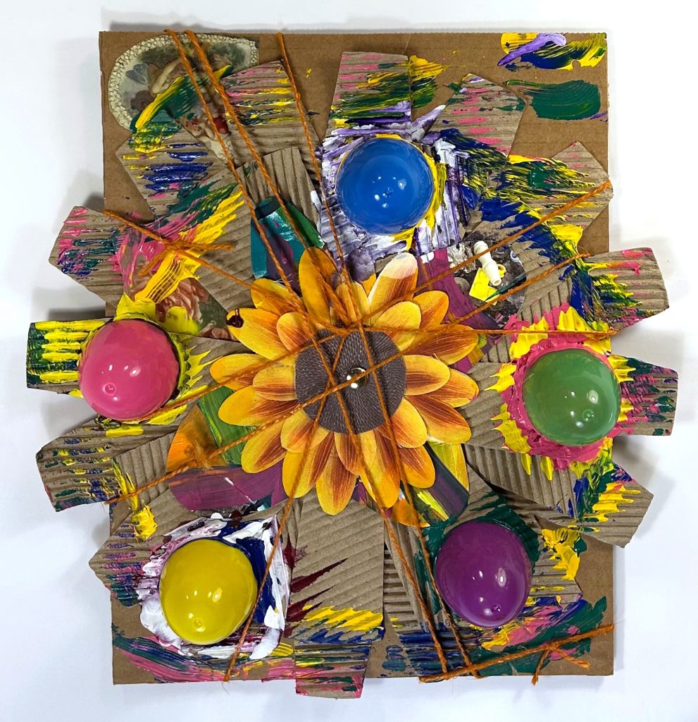 Bell and Ganassi I’m Always Spinning on Eggshells, 2025-26 Plastic egg halves, cord, paper flower, cherub cutout, and acrylic on corrugated cardboard packaging on cardboard 11.5 x 11 inches
