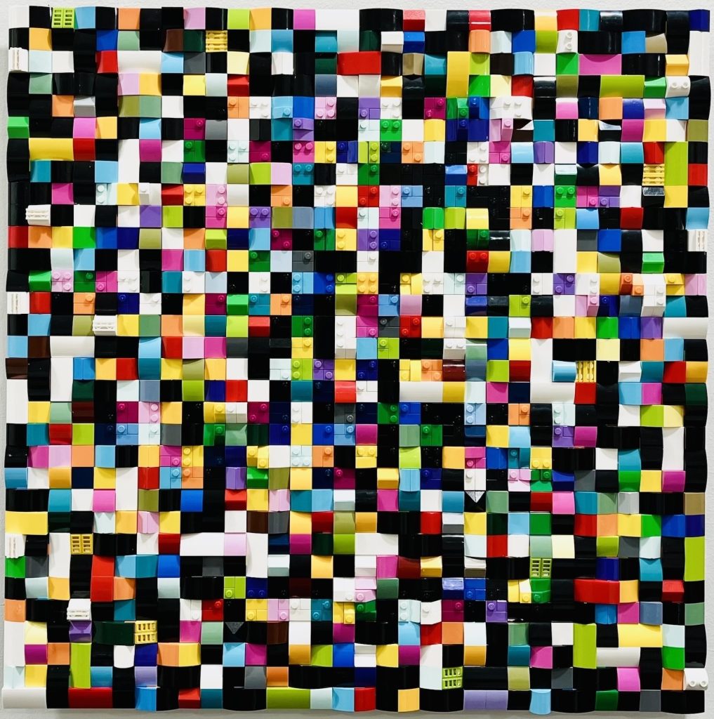 Jaye Moon Fluid Spectrum, 2025 ‘Identity is a fluid spectrum’ in Braille 800 Lego bricks on Plexiglas 15 x 15 x 1.5 inches