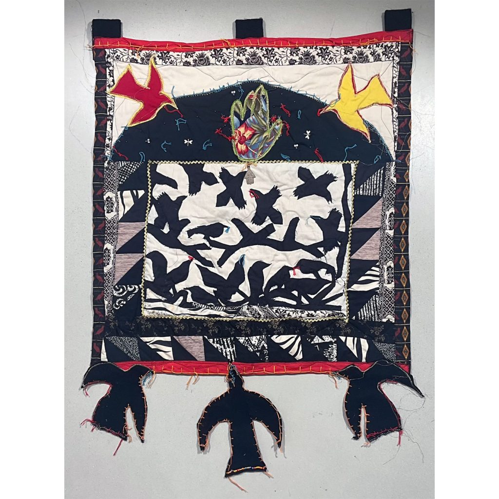 Janet Taylor Pickett Fly Away Home, 1993 Fabric construction with silver charms on cotton, felt 45 x 33 inches Signed, dated, and inscribed by the artist